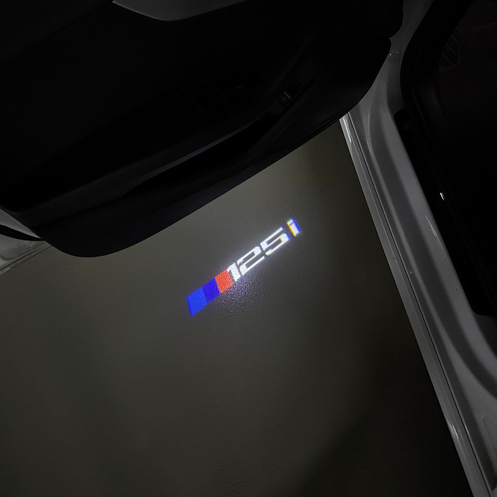 BMW M3 LOGO PROJECTOR LIGHTS Nr.24 (الكمية 1 = 1 مجموعة / 2 أضواء باب)