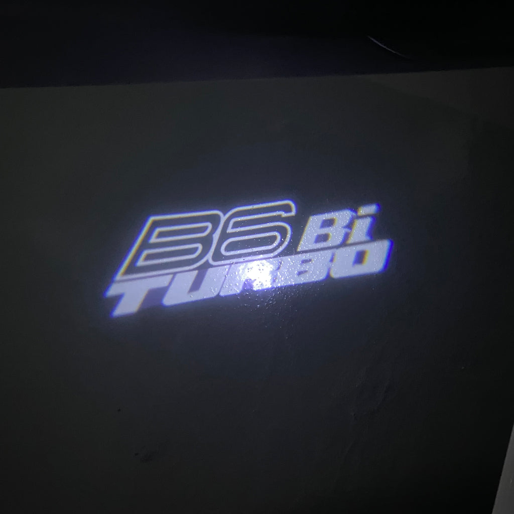 ALPINA B6 Bi TURBO   LOGO PROJECTOT LIGHTS  (quantity 1 = 1 sets/2 door lights) Nr.07A44