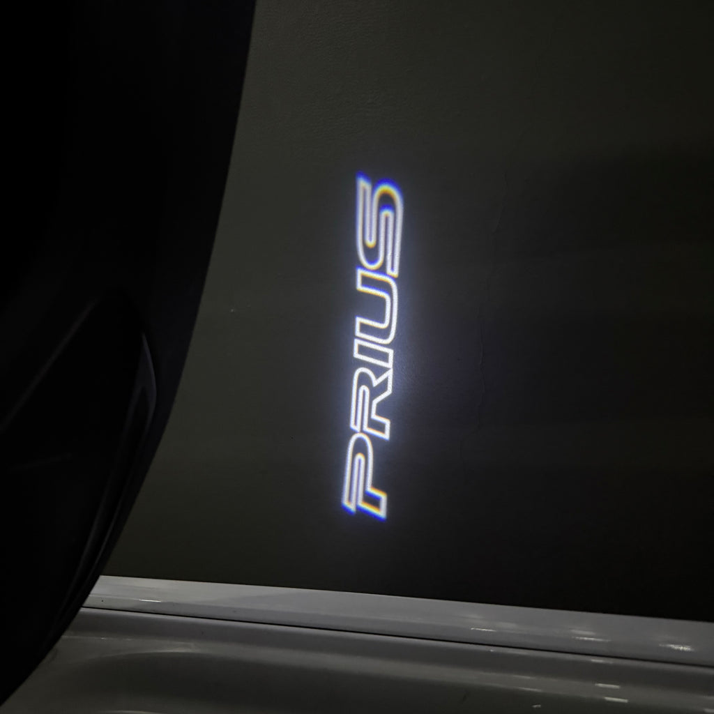 TOYOTA  PRIUS  LOGO PROJECROTR LIGHTS  (quantity 1 = 1 sets/2 door lights) Nr.0G23