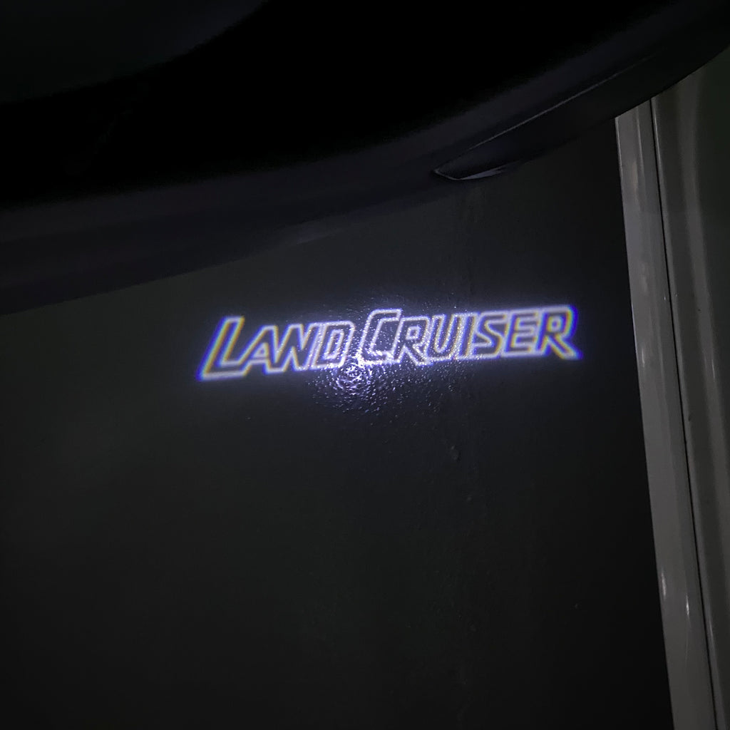 TOYOTA  LAND CRUISER  LOGO PROJECROTR LIGHTS  (quantity 1 = 1 sets/2 door lights) Nr.0G01