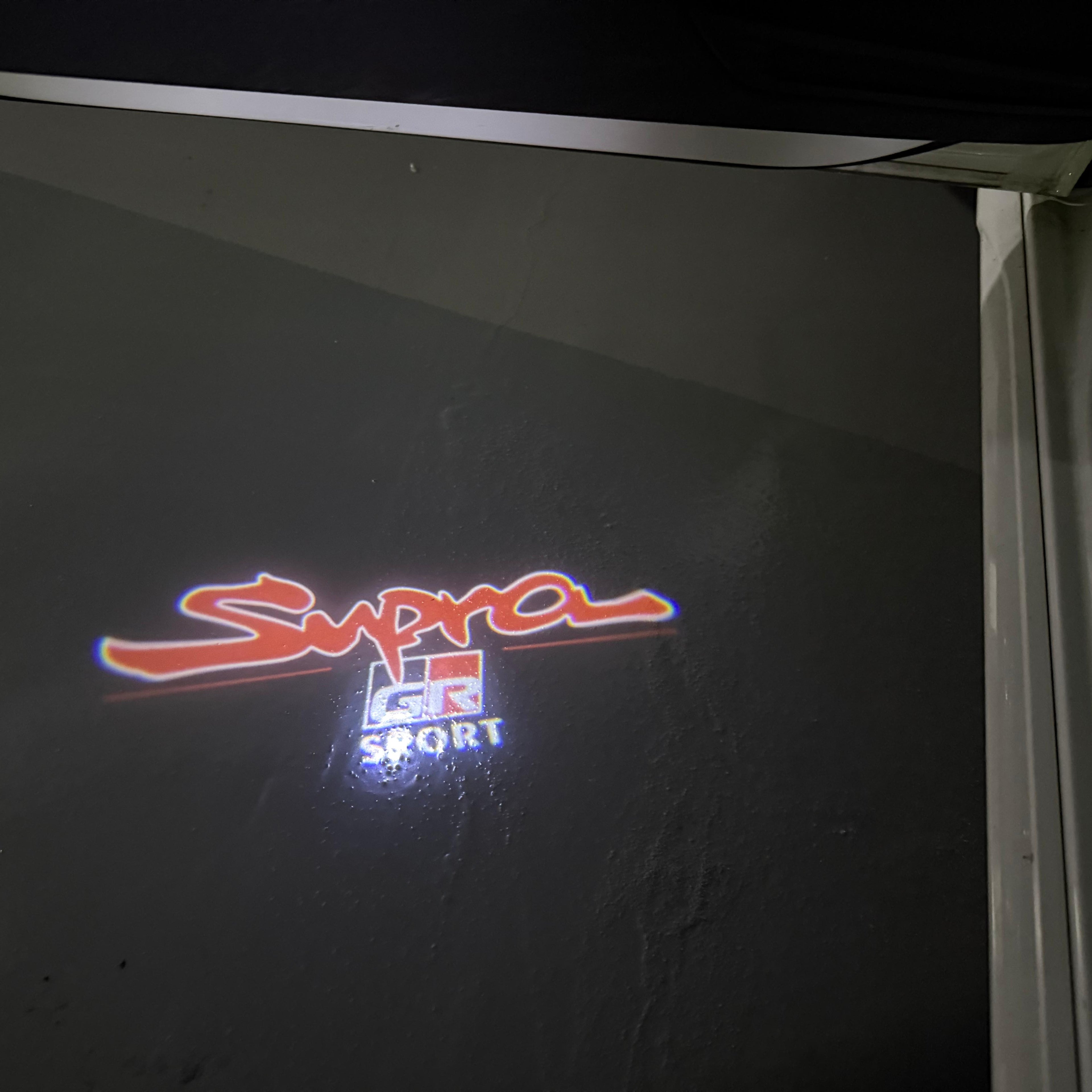 TOYOTA  SUPRA    LOGO PROJECROTR LIGHTS  (quantity 1 = 1 sets/2 door lights) Nr.0G35