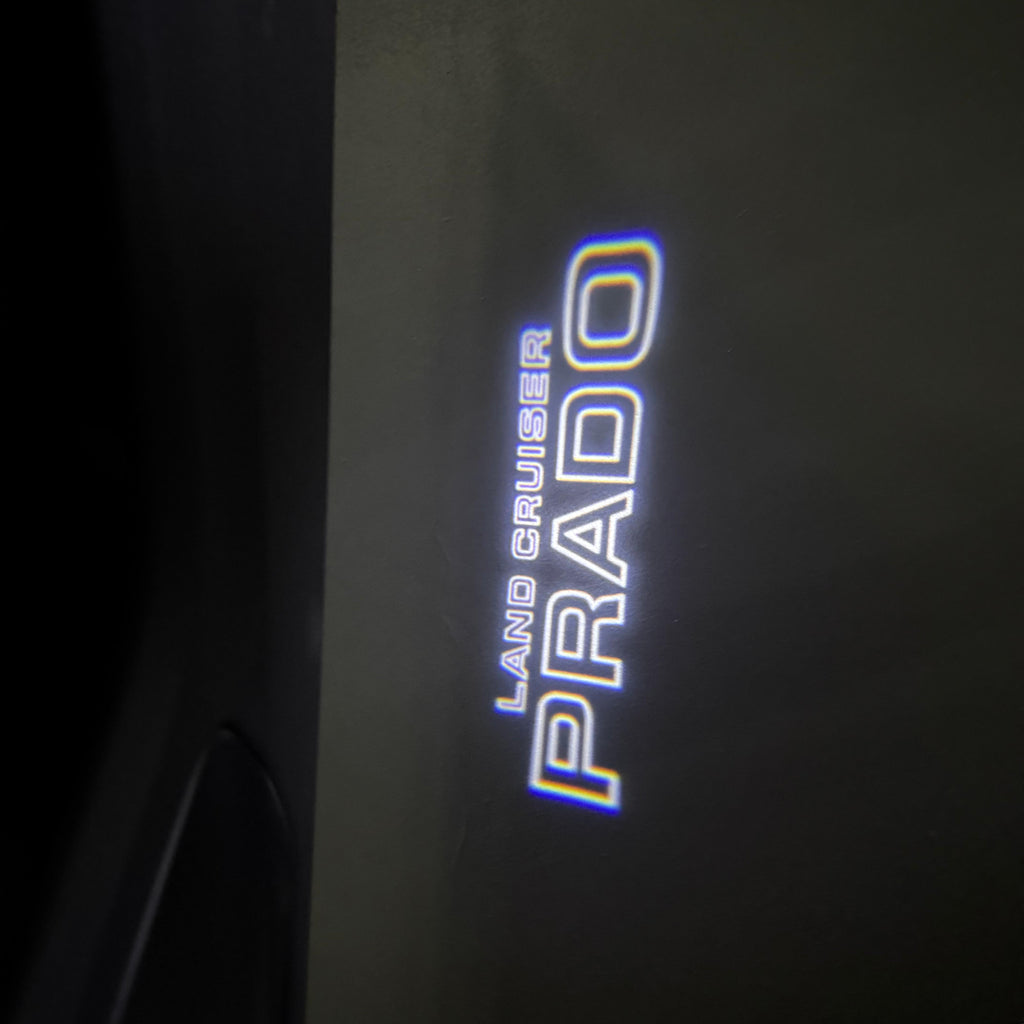 TOYOTA  PRADO LOGO PROJECROTR LIGHTS  (quantity 1 = 1 sets/2 door lights) Nr.0G18