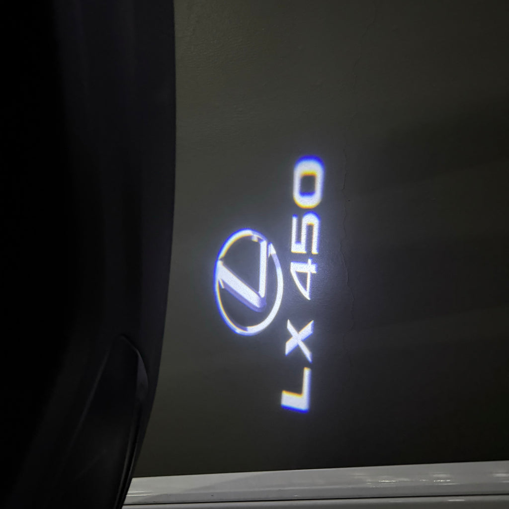 LEXUS LOGO PROJECTOR LIGHTS Nr.01 (الكمية 1 = 1 مجموعة / 2 أضواء باب)