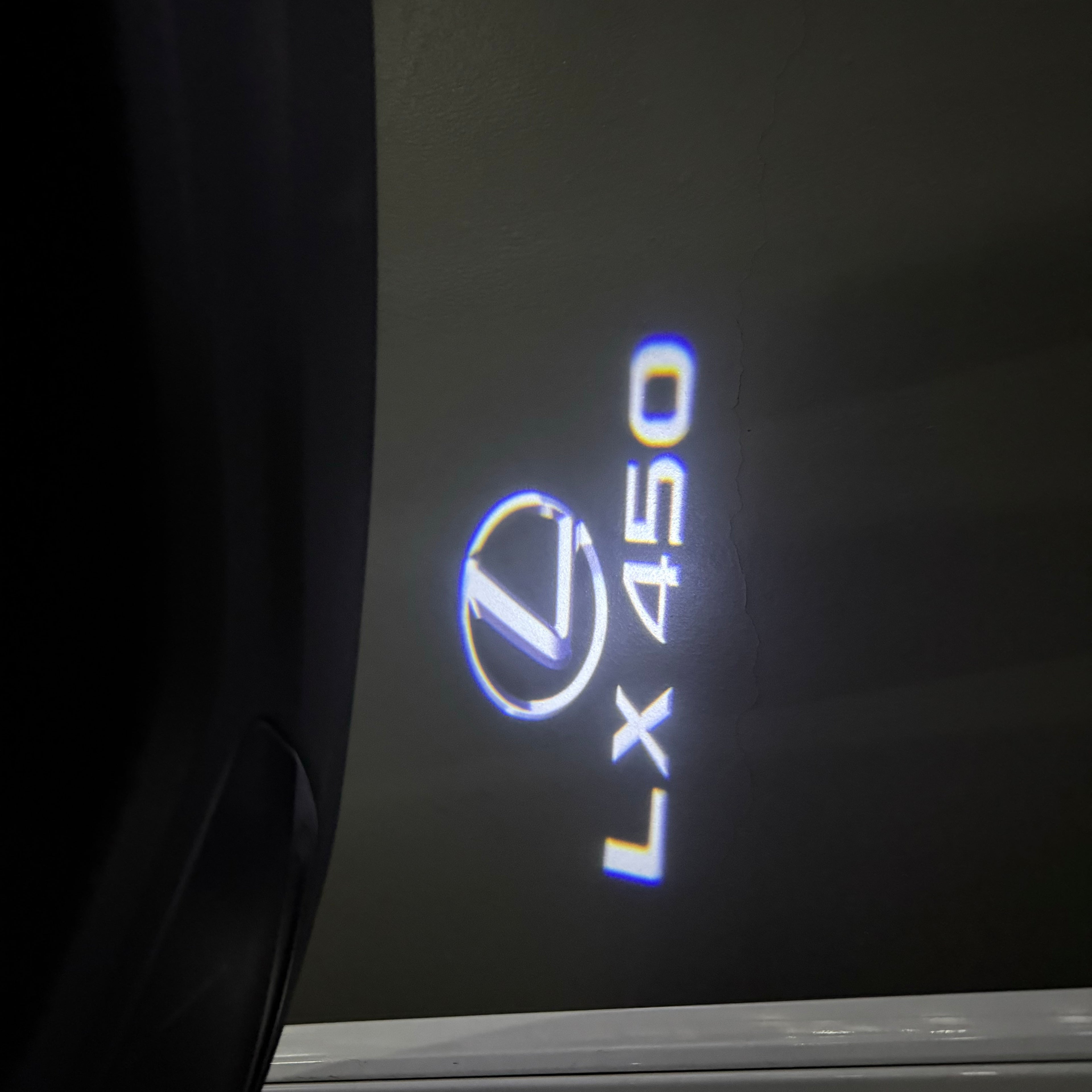 LEXUS LOGO PROJECTOR LIGHTS Nr.01 (الكمية 1 = 1 مجموعة / 2 أضواء باب)