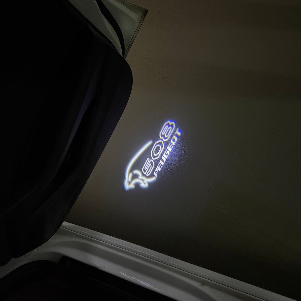 BMW M3 LOGO PROJECTOR LIGHTS Nr.24 (الكمية 1 = 1 مجموعة / 2 أضواء باب)