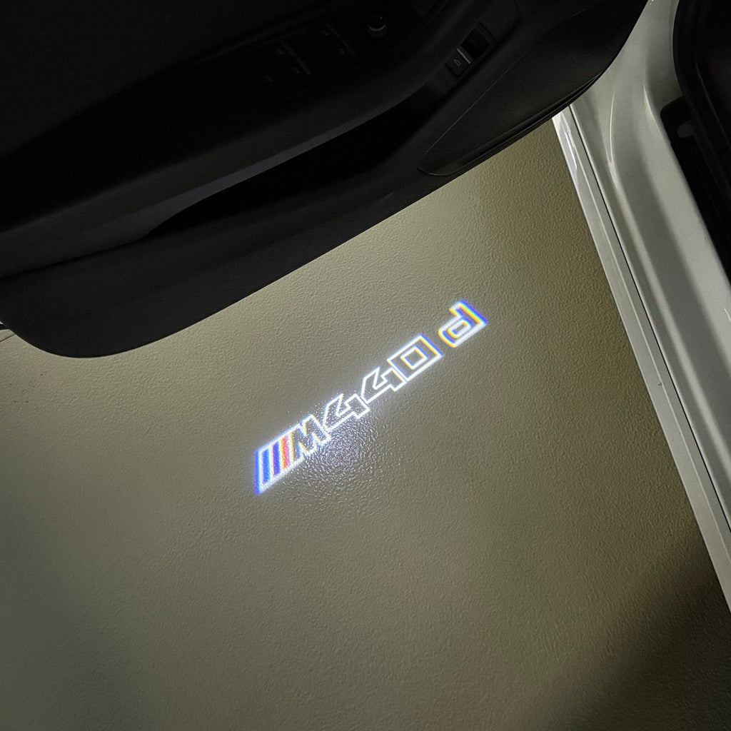 BMW M3 LOGO PROJECTOR LIGHTS Nr.24 (الكمية 1 = 1 مجموعة / 2 أضواء باب)