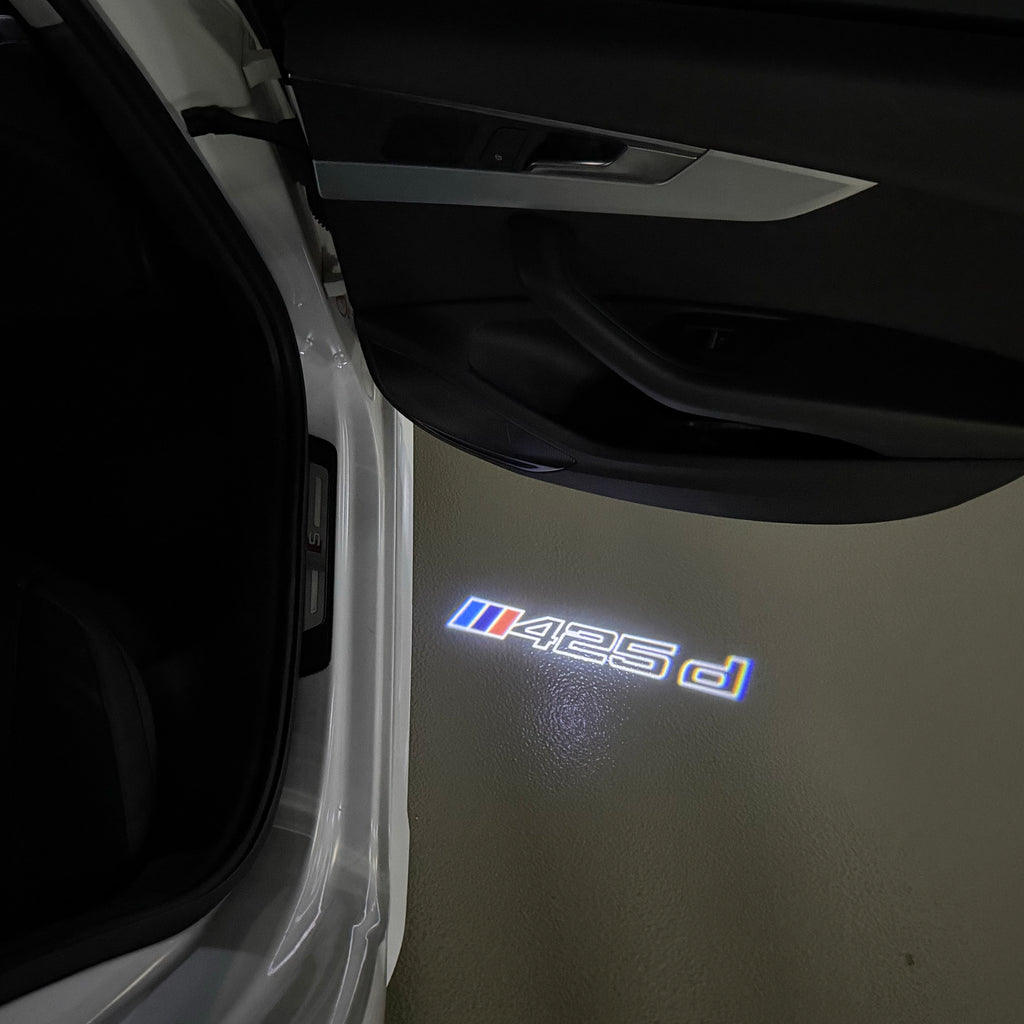 BMW M3 LOGO PROJECTOR LIGHTS Nr.24 (الكمية 1 = 1 مجموعة / 2 أضواء باب)
