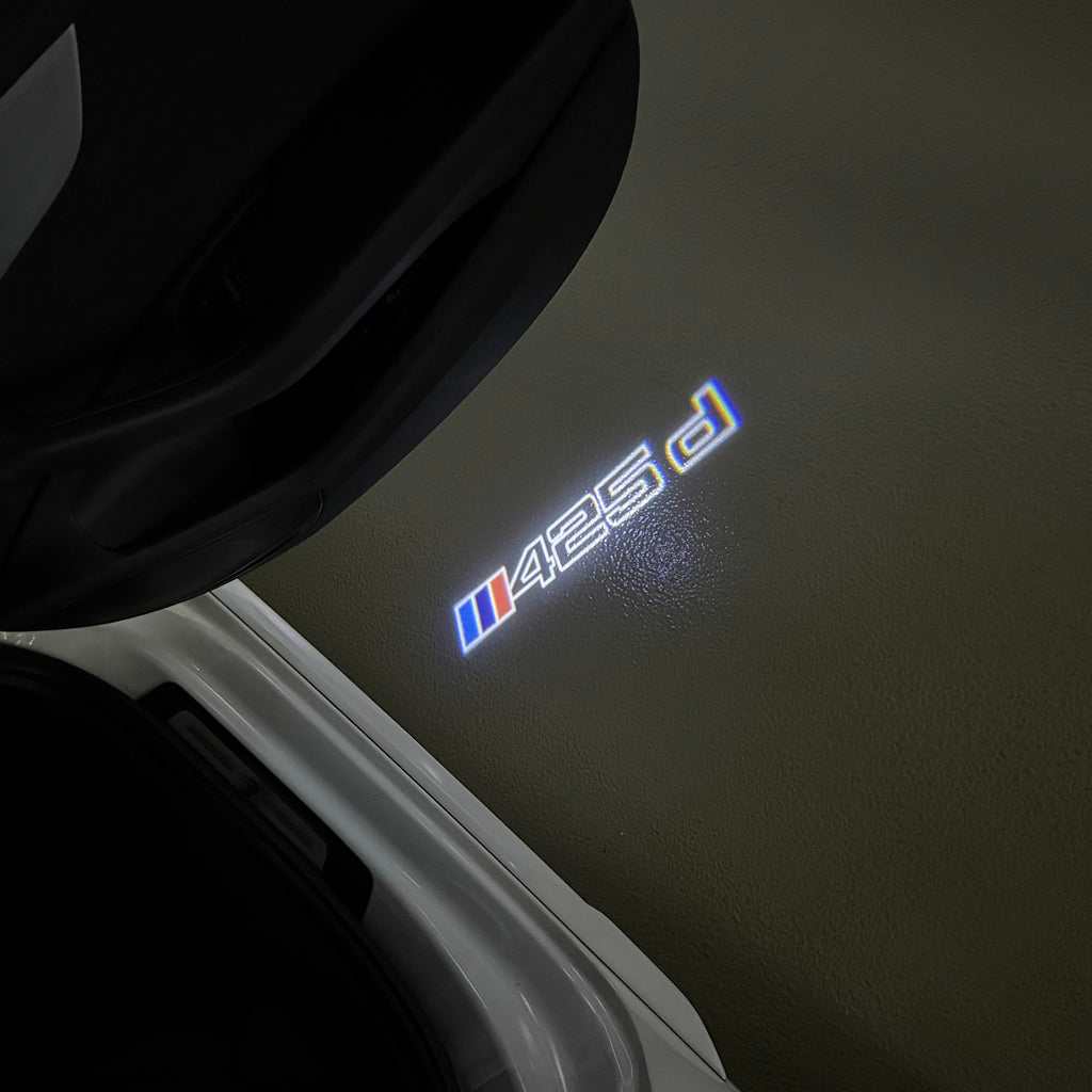 BMW M3 LOGO PROJECTOR LIGHTS Nr.24 (الكمية 1 = 1 مجموعة / 2 أضواء باب)