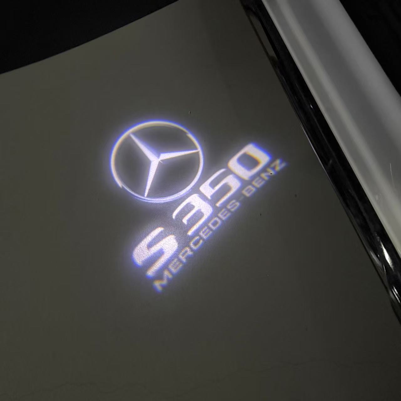 MERCEDES BENZ S 350 LOGO PROJECTOR LIGHTS  (quantity 1 = 1 sets/2 door lights)Nr.03f027