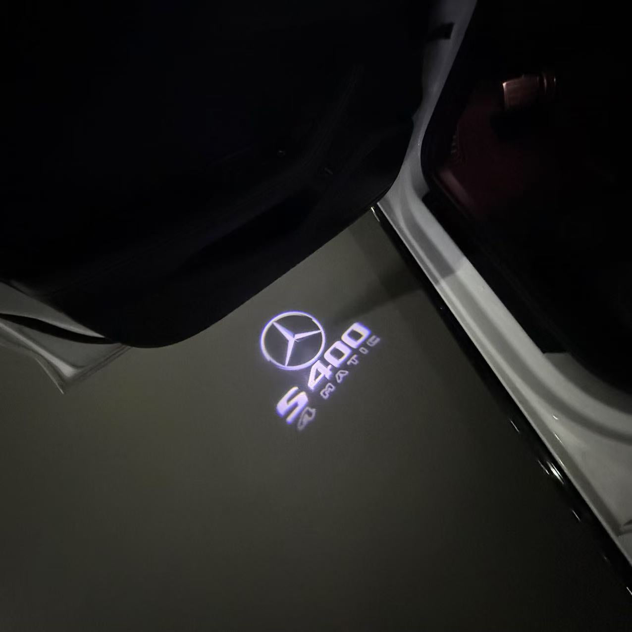 MERCEDES BENZ S 400 LOGO PROJECTOR LIGHTS  (quantity 1 = 1 sets/2 door lights)Nr.03f031