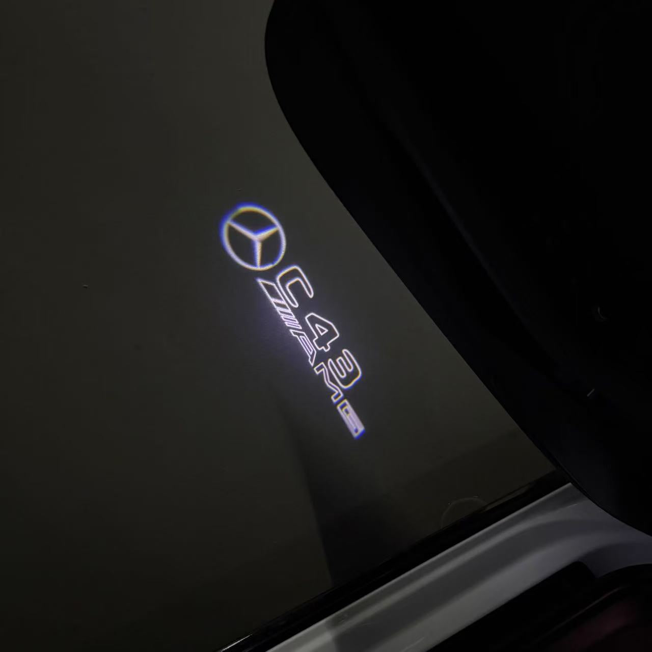 MERCEDES BENZ  C43 AMG LOGO PROJECTOT LIGHTS  (quantity 1 = 1 sets/2 door lights)Nr.03f04
