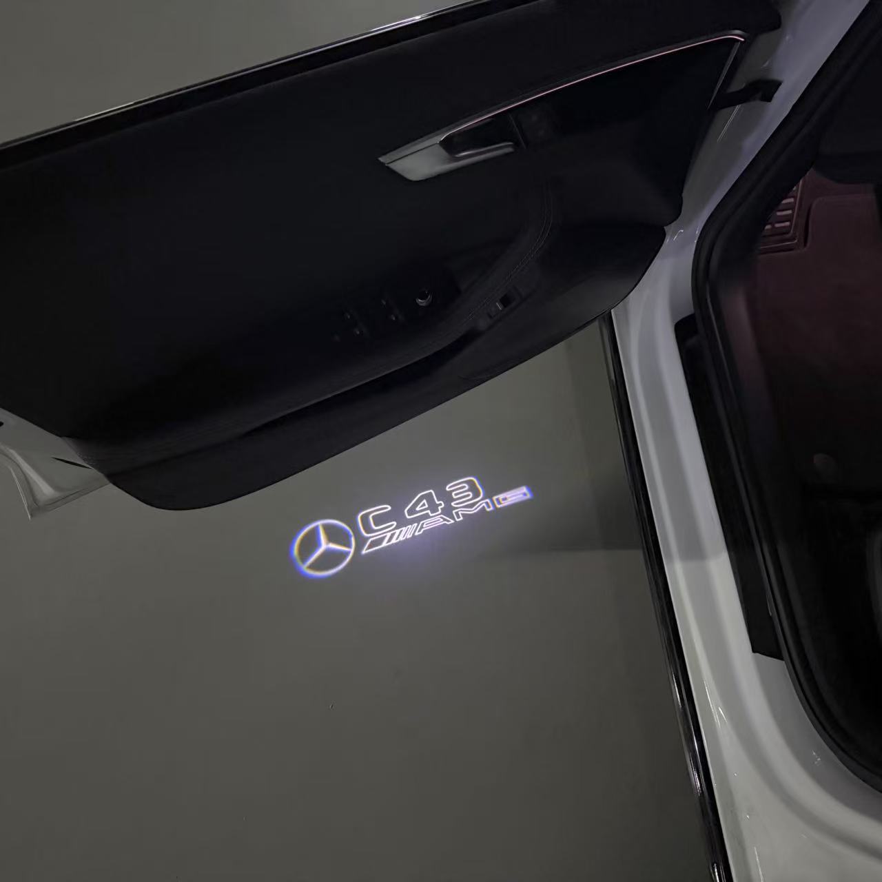 MERCEDES BENZ  C43 AMG LOGO PROJECTOT LIGHTS  (quantity 1 = 1 sets/2 door lights)Nr.03f04