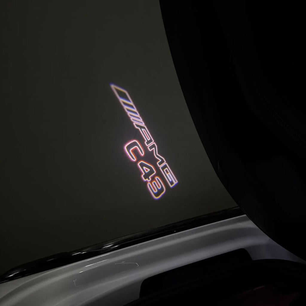 MERCEDES BENZ  C43 AMG LOGO PROJECTOT LIGHTS  (quantity 1 = 1 sets/2 door lights)Nr.03f07