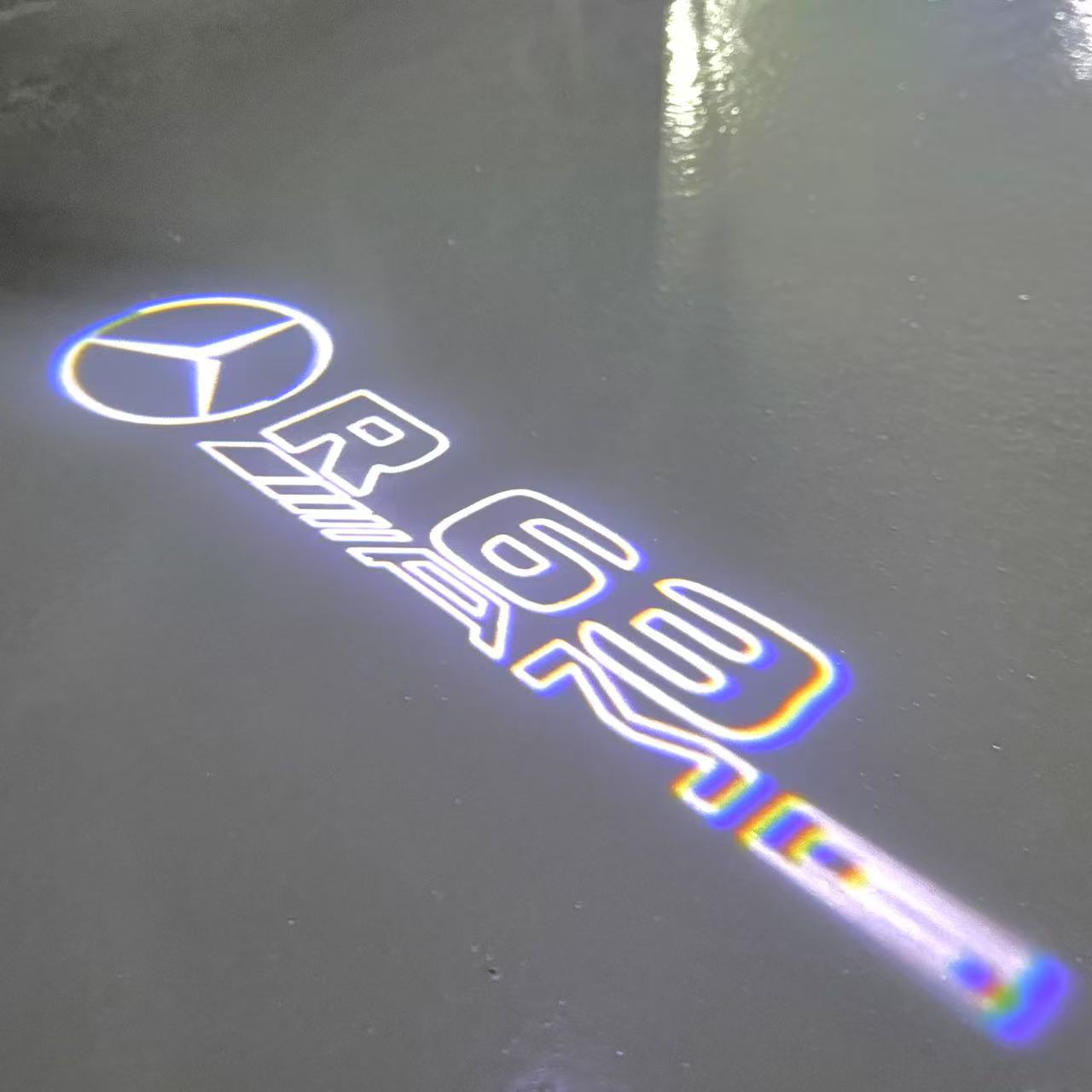 MERCEDES BENZ R 63 AMG LOGO PROJECTOR LIGHTS  (quantity 1 = 1 sets/2 door lights)Nr.03f025