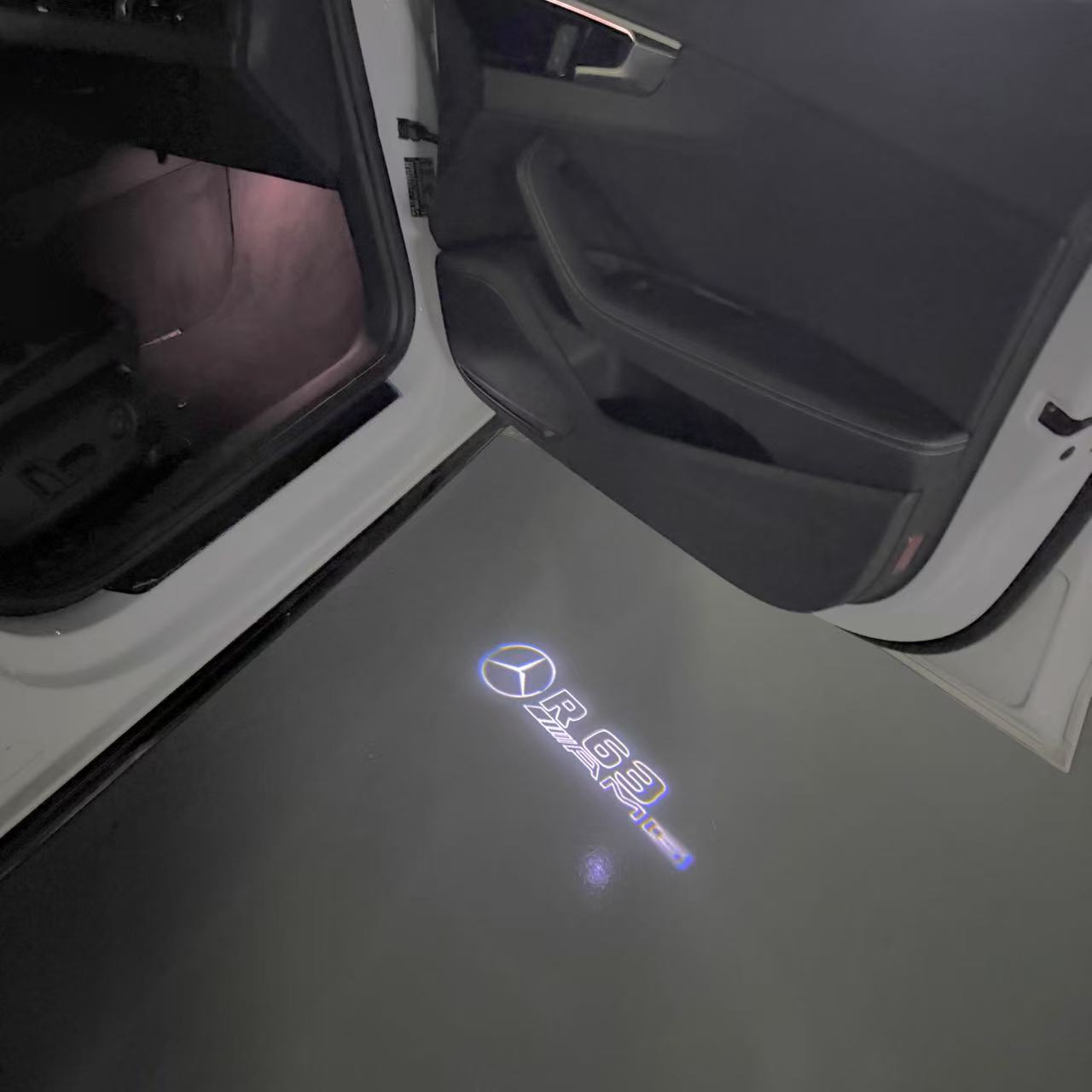 MERCEDES BENZ R 63 AMG LOGO PROJECTOR LIGHTS  (quantity 1 = 1 sets/2 door lights)Nr.03f043
