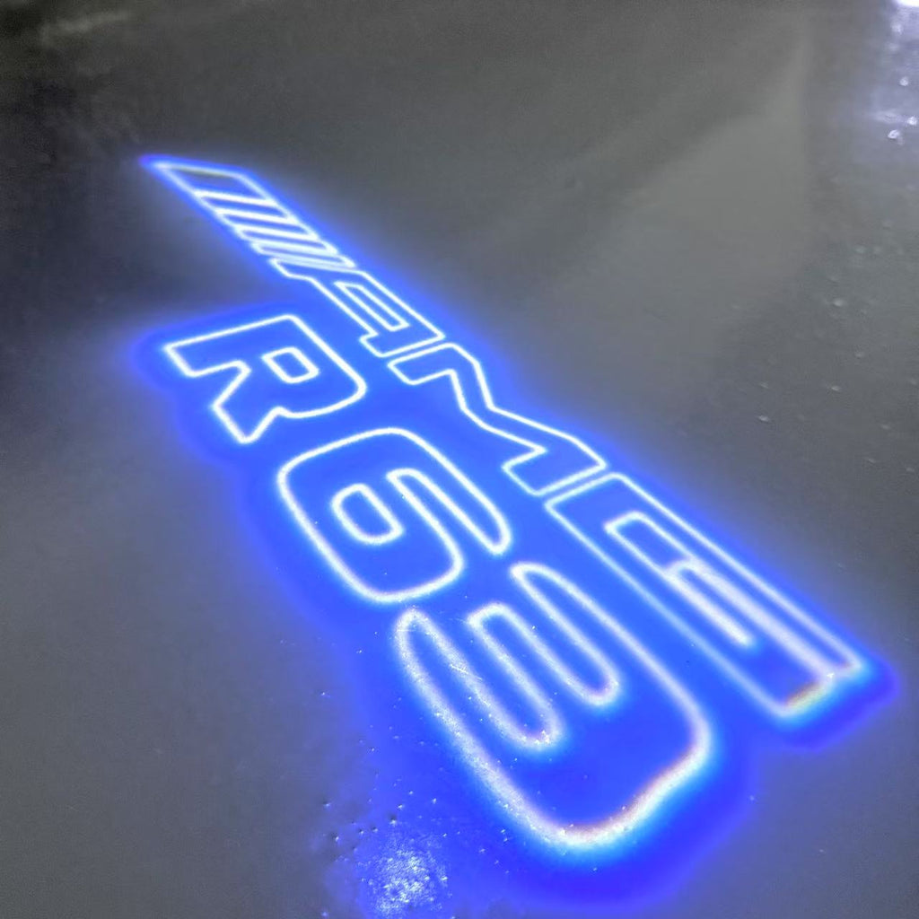 MERCEDES BENZ R 63 AMG LOGO PROJECTOR LIGHTS  (quantity 1 = 1 sets/2 door lights)Nr.03f045