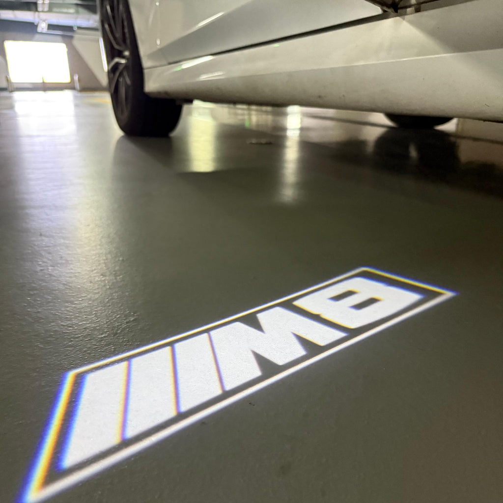BMW M3 LOGO PROJECTOR LIGHTS Nr.24 (الكمية 1 = 1 مجموعة / 2 أضواء باب)