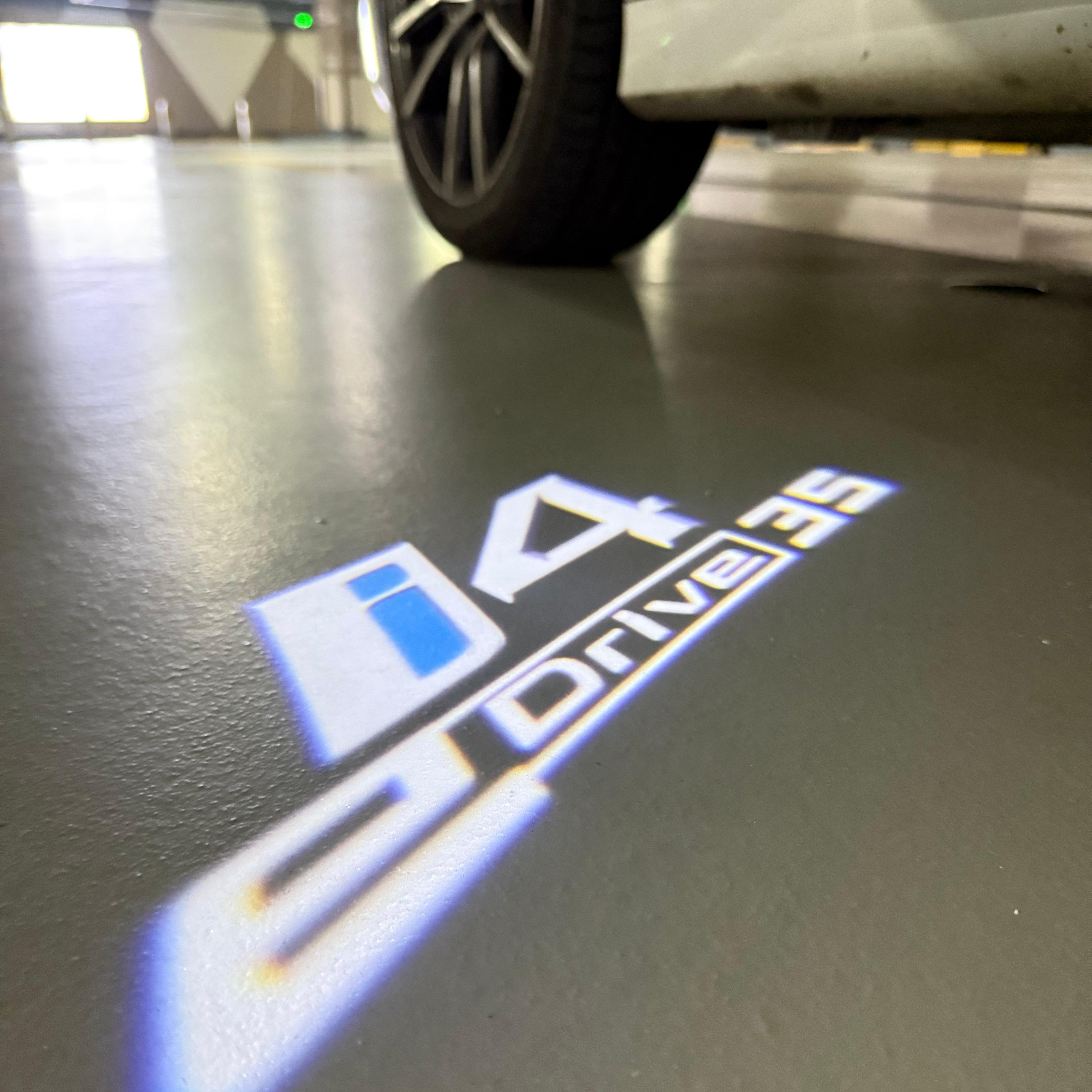BMW M3 LOGO PROJECTOR LIGHTS Nr.24 (الكمية 1 = 1 مجموعة / 2 أضواء باب)
