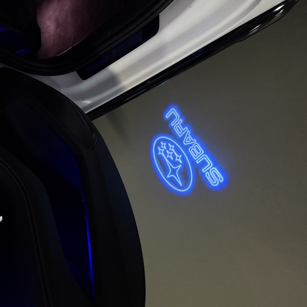 SUBARU ORIGINAL LOGO PROJECROTR LIGHTS (quantity 1 = 1 sets/2 door lights) Nr.9
