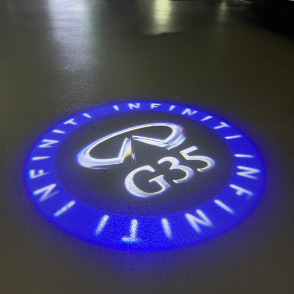 INFINITI  G35 LOGO PROJECROTR LIGHTS  (quantity 1 = 1 sets/2 door lights)Nr.74A58