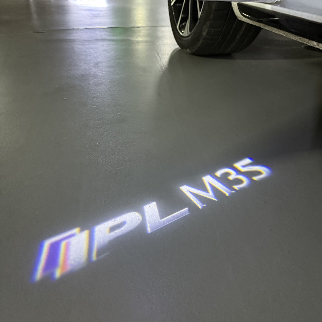 INFINITI  M35 LOGO PROJECROTR LIGHTS  (quantity 1 = 1 sets/2 door lights)Nr.74A94