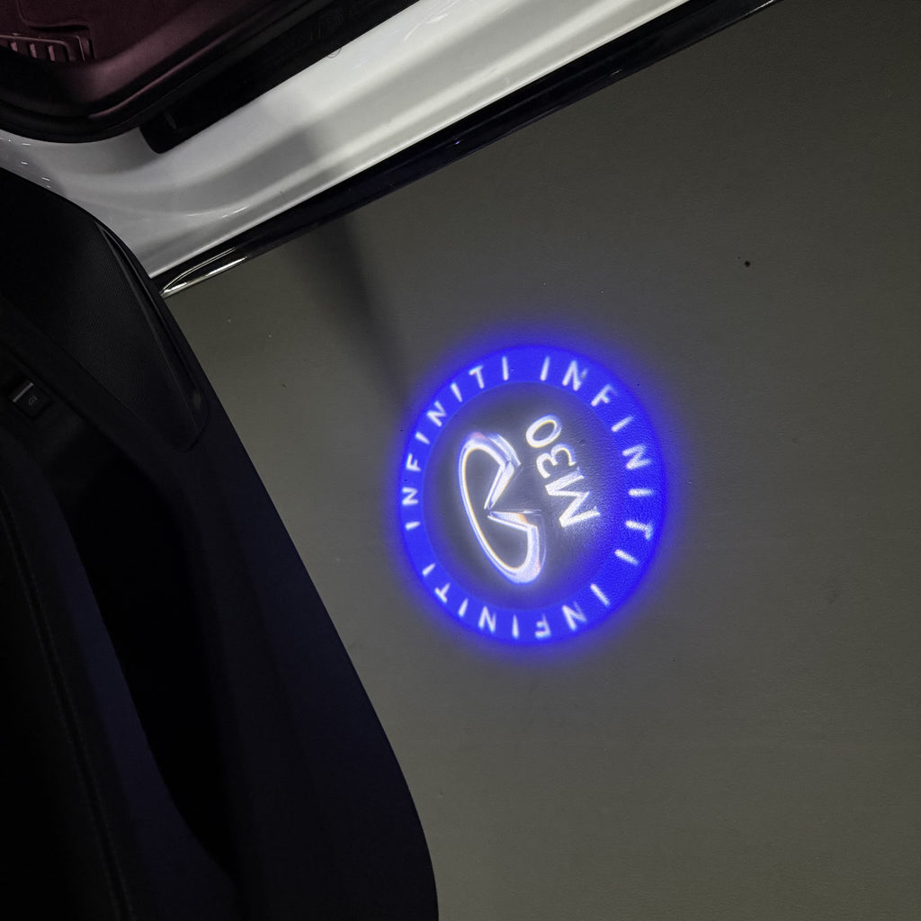 INFINITI  M30 LOGO PROJECROTR LIGHTS  (quantity 1 = 1 sets/2 door lights)Nr.74A96