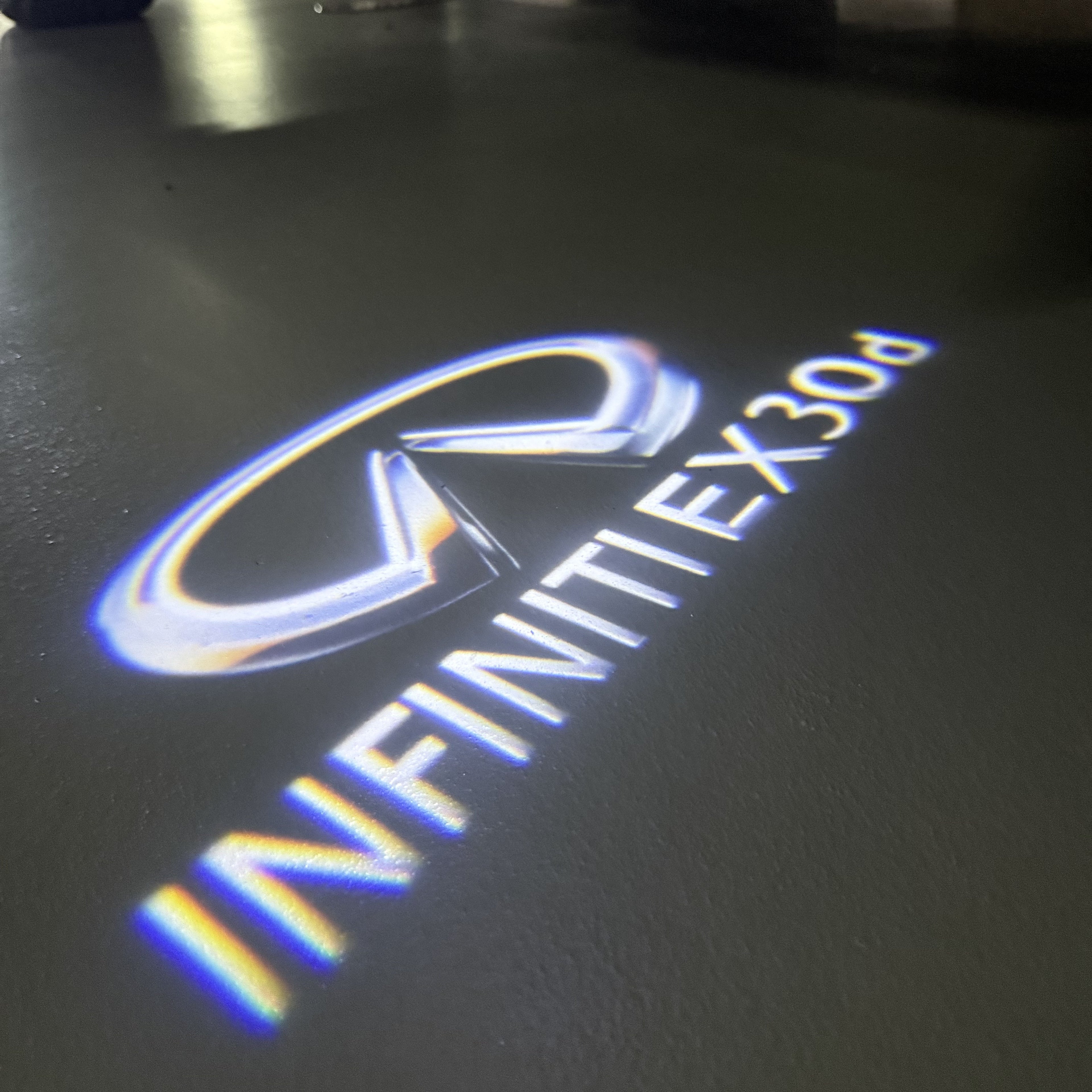 INFINITI  EX30d LOGO PROJECROTR LIGHTS  (quantity 1 = 1 sets/2 door lights)Nr.74A49