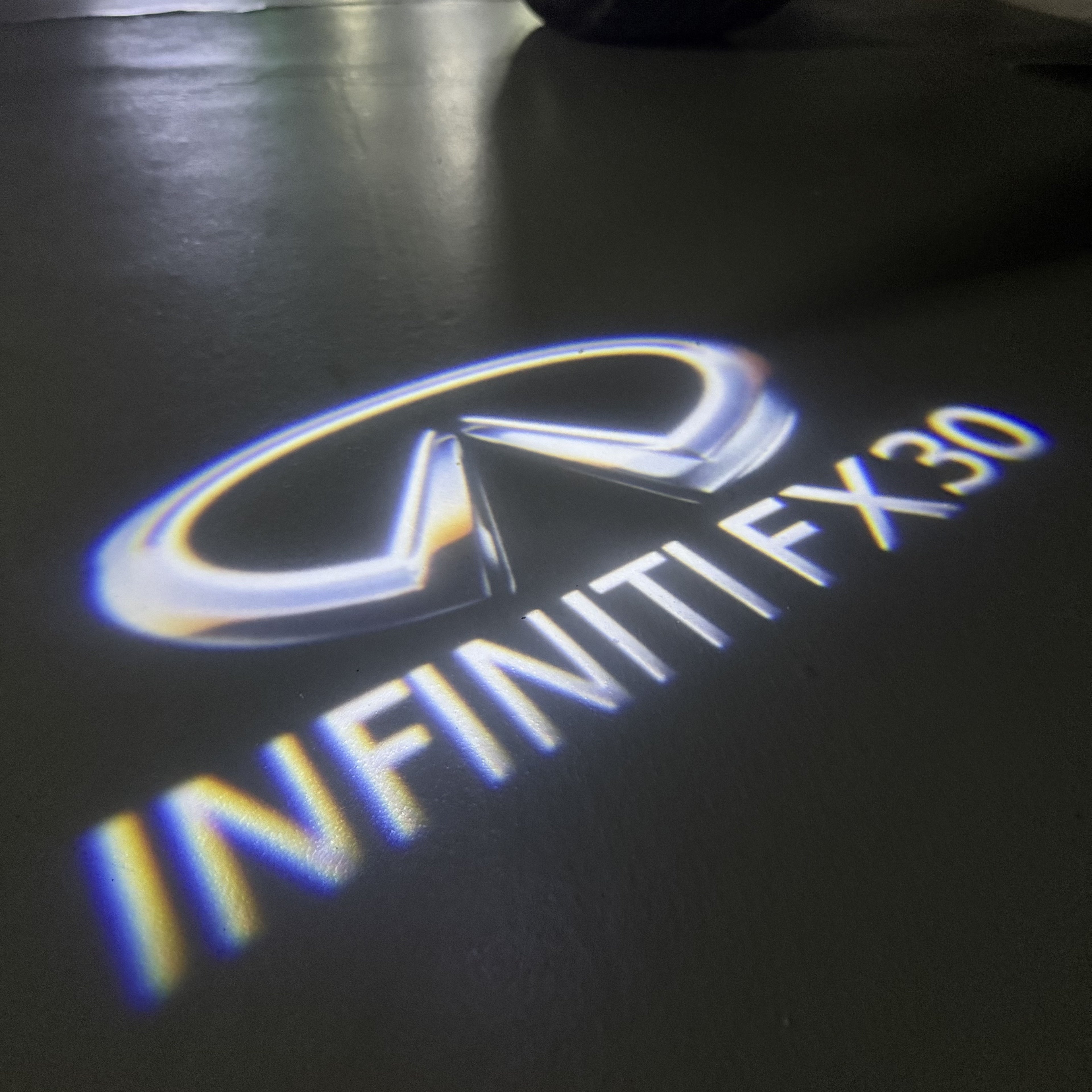INFINITI  FX30 LOGO PROJECROTR LIGHTS  (quantity 1 = 1 sets/2 door lights)Nr.74A82