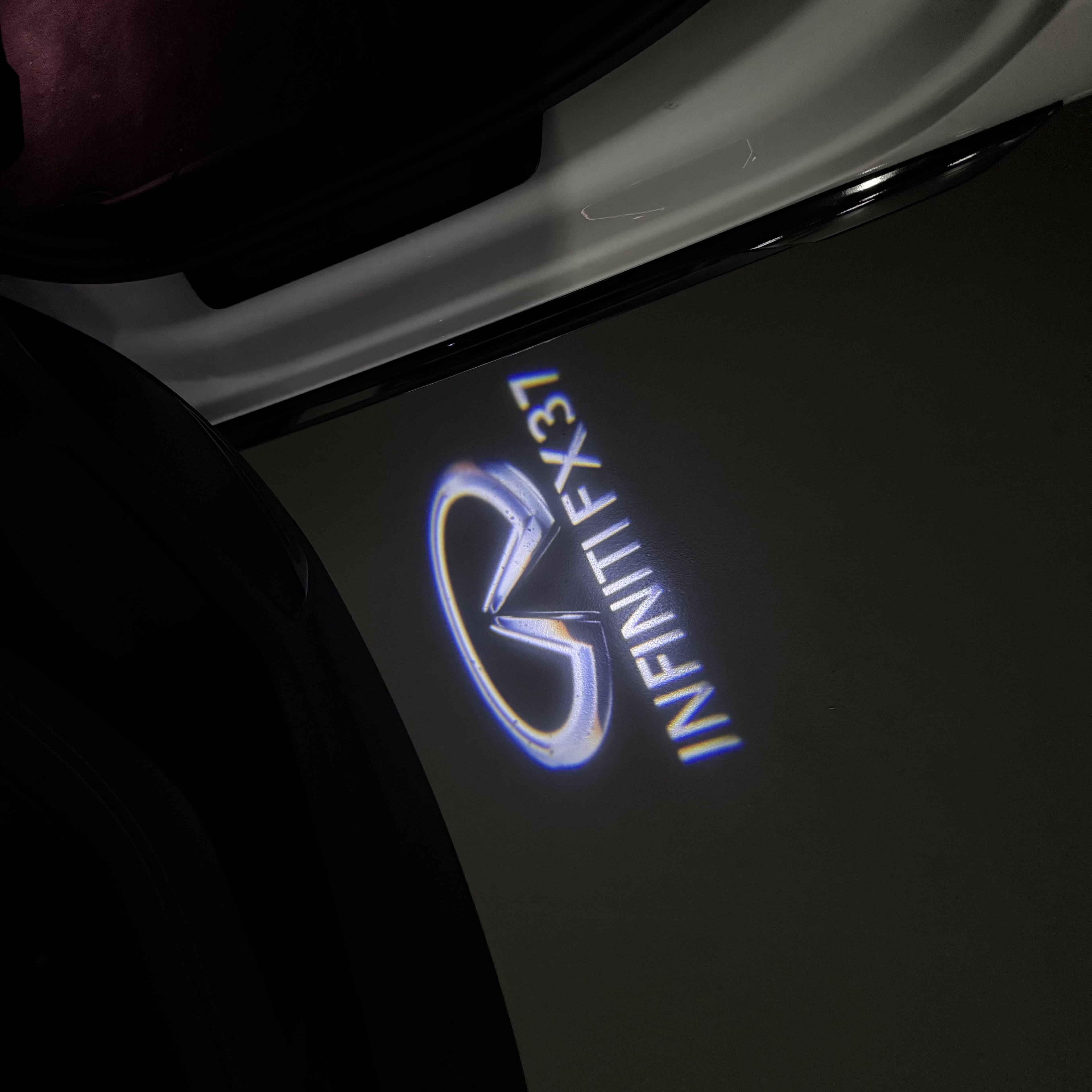 INFINITI  FX37 LOGO PROJECROTR LIGHTS  (quantity 1 = 1 sets/2 door lights)Nr.74A75