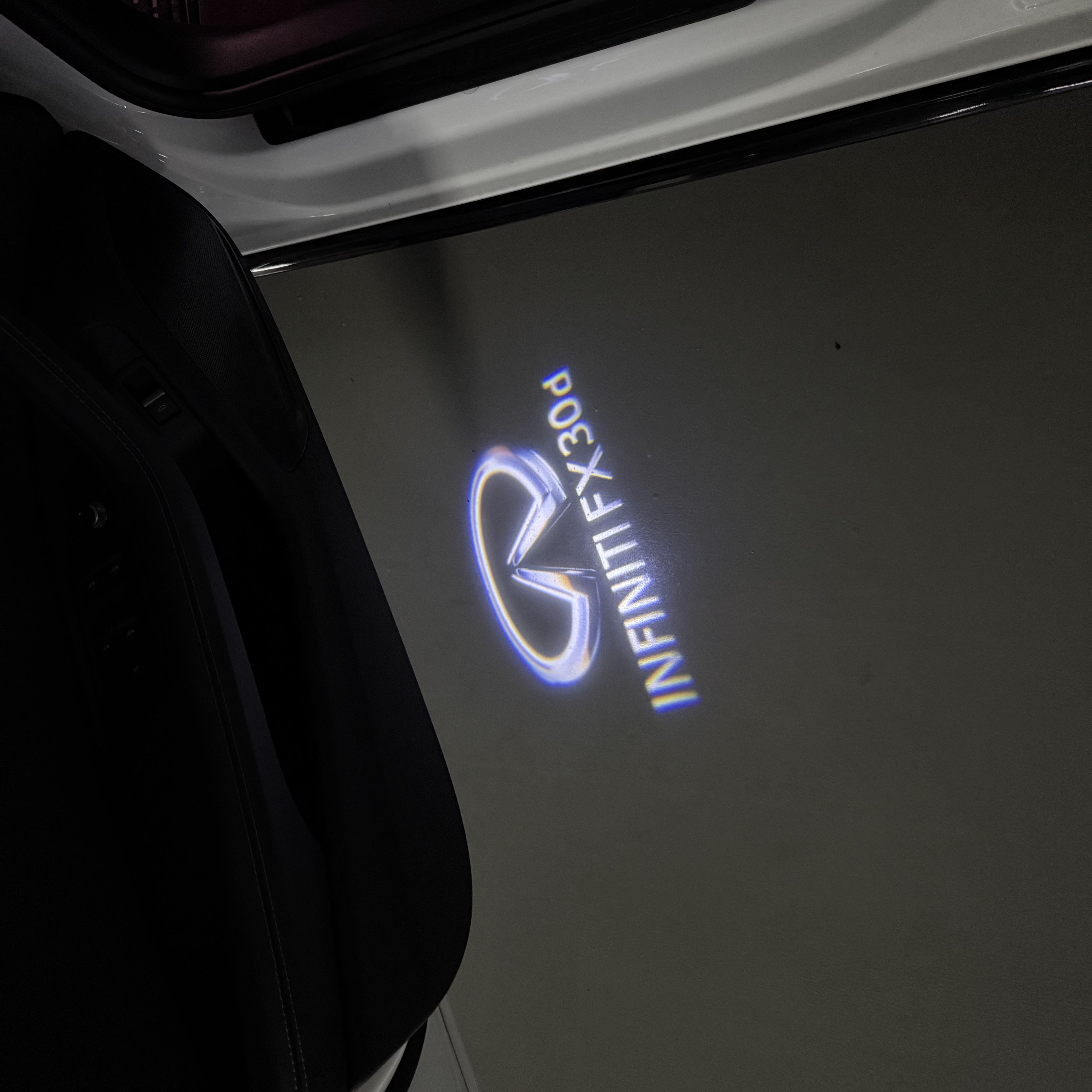 INFINITI  FX30d LOGO PROJECROTR LIGHTS  (quantity 1 = 1 sets/2 door lights)Nr.74A78