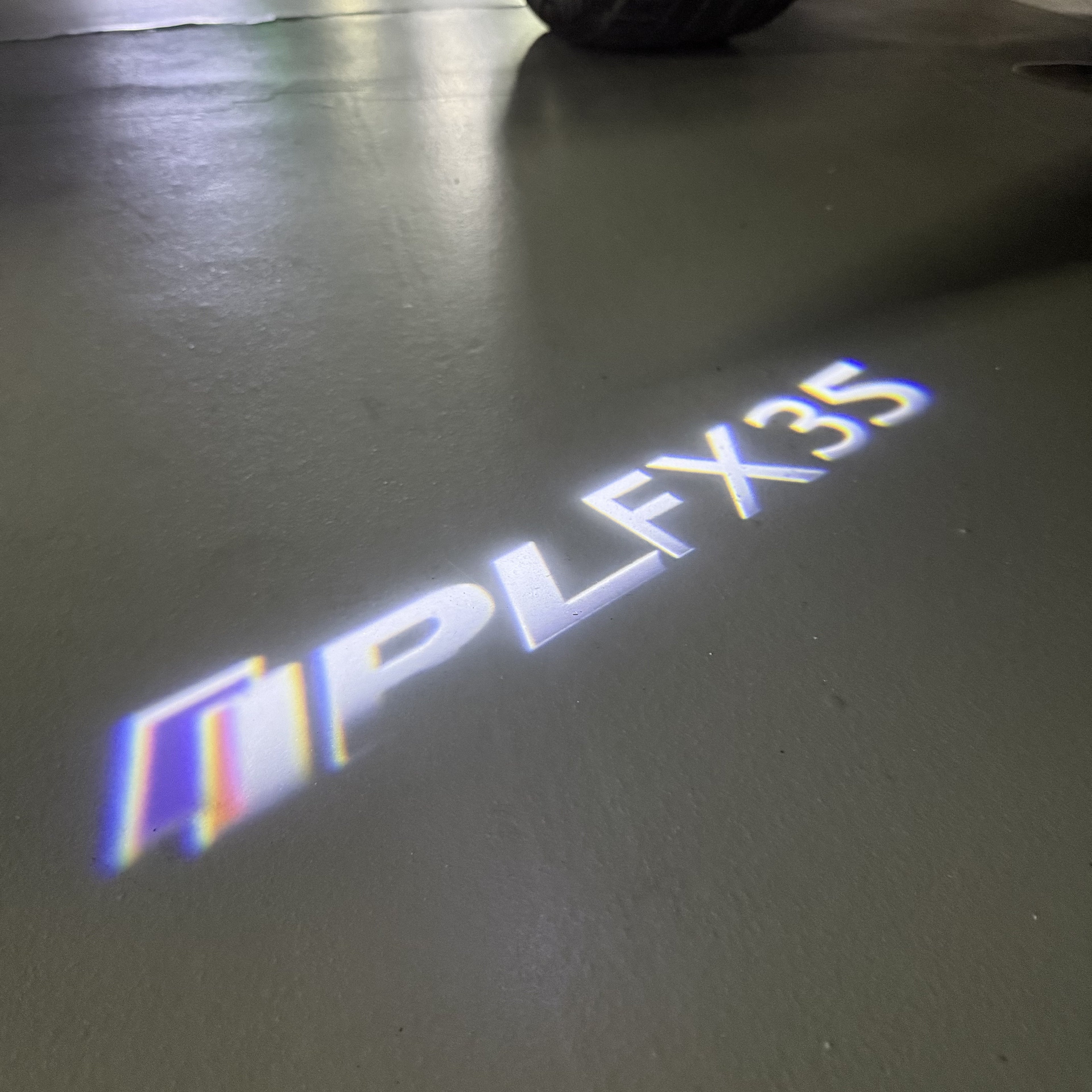 INFINITI  FX35 LOGO PROJECROTR LIGHTS  (quantity 1 = 1 sets/2 door lights)Nr.74A66