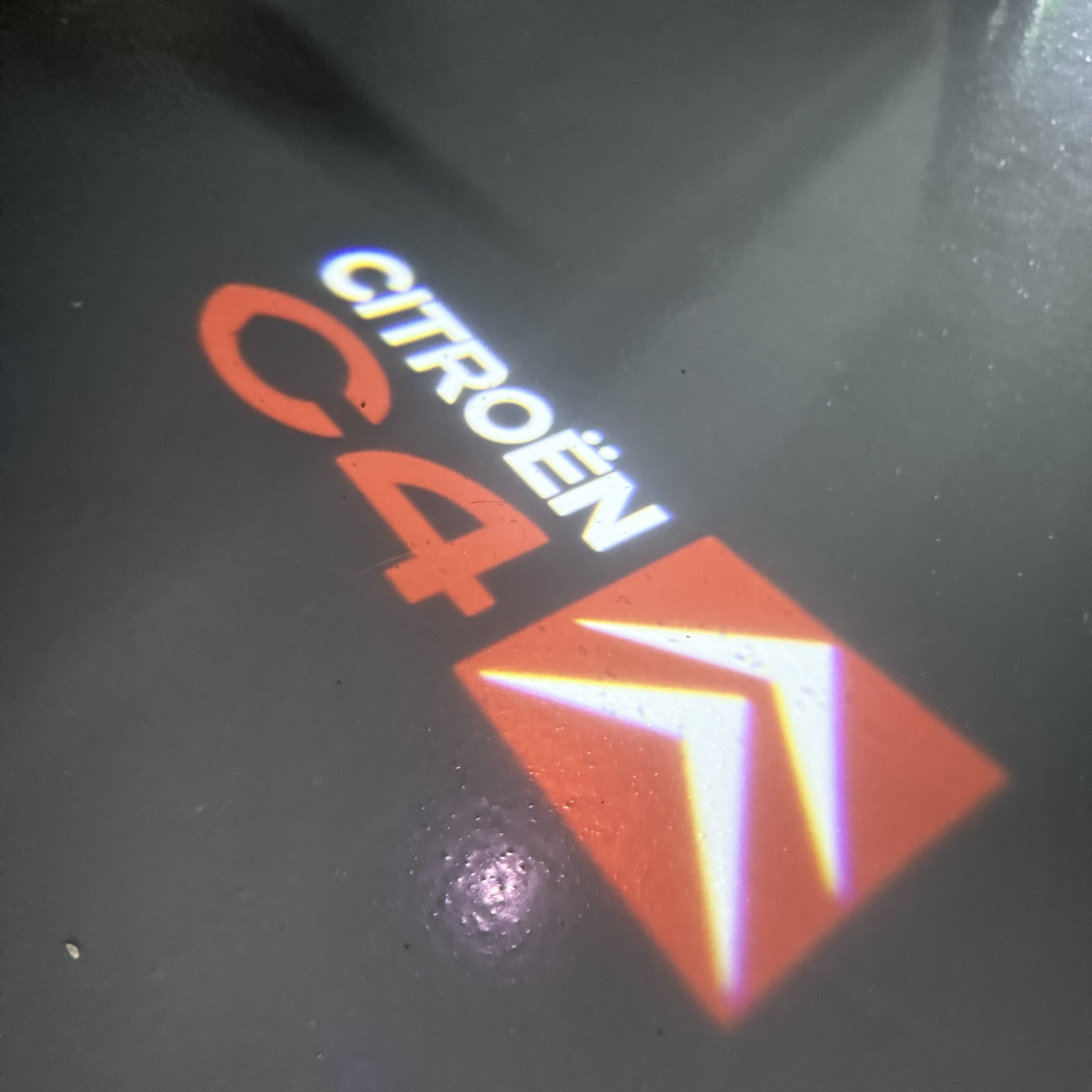 CITROËN C4  LOGO PROJECTOT LIGHTS (quantity 1 = 1 sets/2 door lights) Nr.6024q0t0141