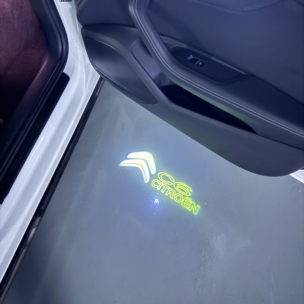 CITROËN C6  LOGO PROJECTOT LIGHTS (quantity 1 = 1 sets/2 door lights) Nr.6024q0t0132