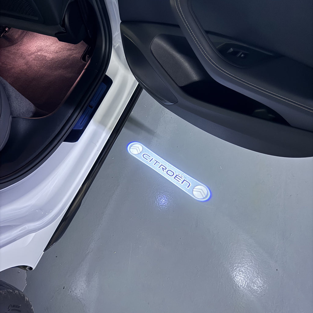 CITROËN Original   LOGO PROJECTOT LIGHTS (quantity 1 = 1 sets/2 door lights) Nr.6024q0t0140