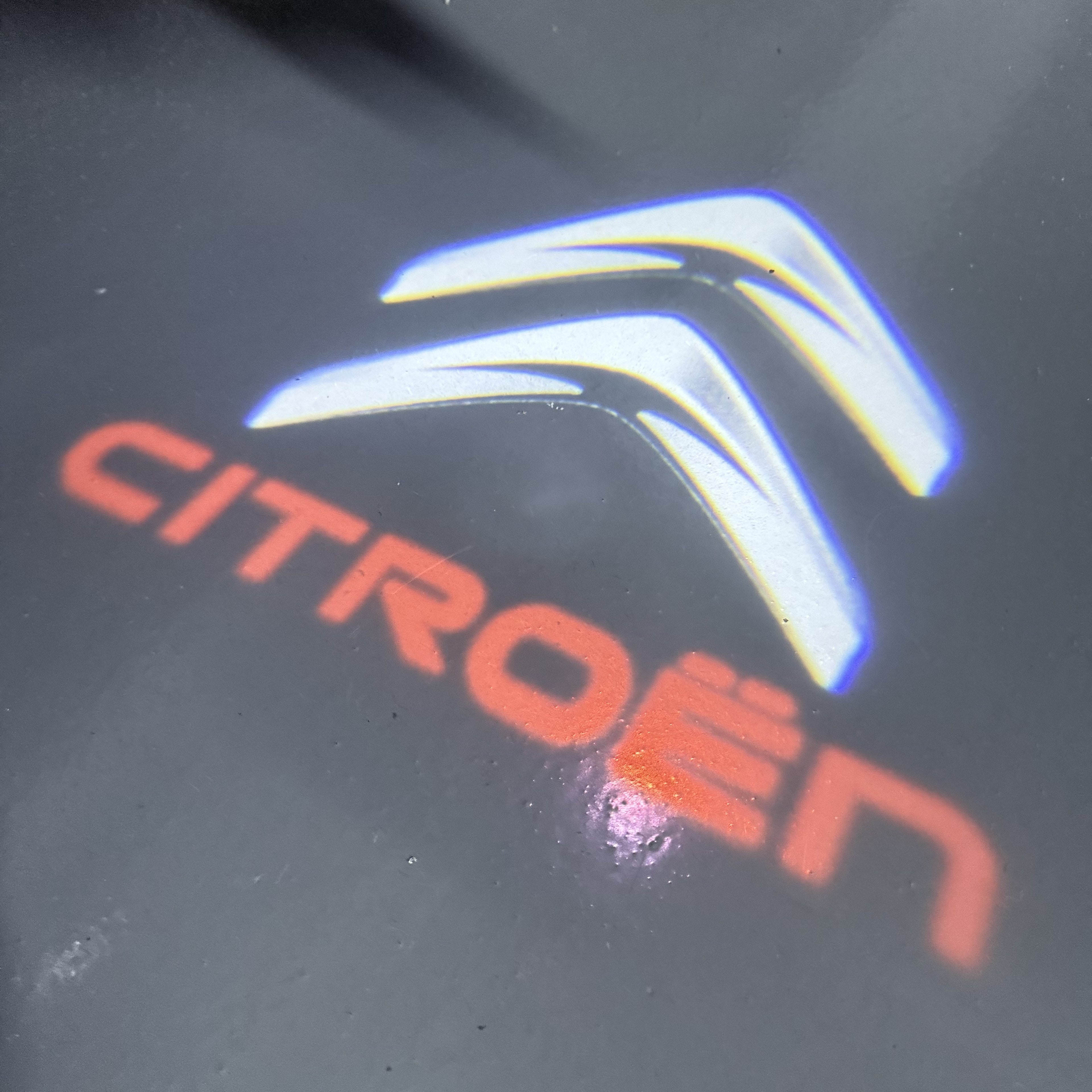 CITROËN Original   LOGO PROJECTOT LIGHTS (quantity 1 = 1 sets/2 door lights) Nr.6024q0t0154