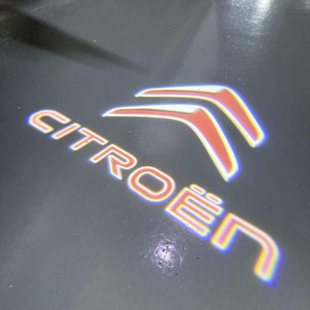 CITROËN Original   LOGO PROJECTOT LIGHTS (quantity 1 = 1 sets/2 door lights) Nr.6024q0t0123