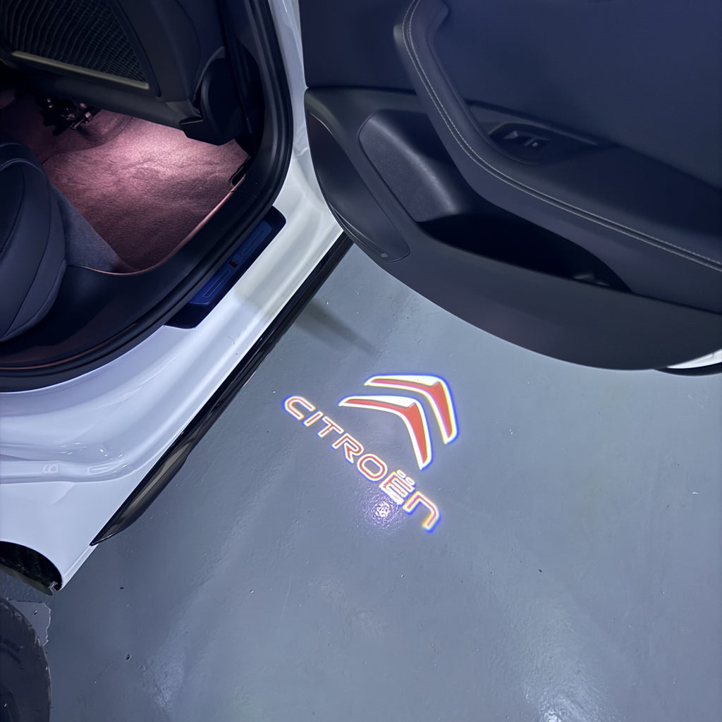 CITROËN Original   LOGO PROJECTOT LIGHTS (quantity 1 = 1 sets/2 door lights) Nr.6024q0t0123