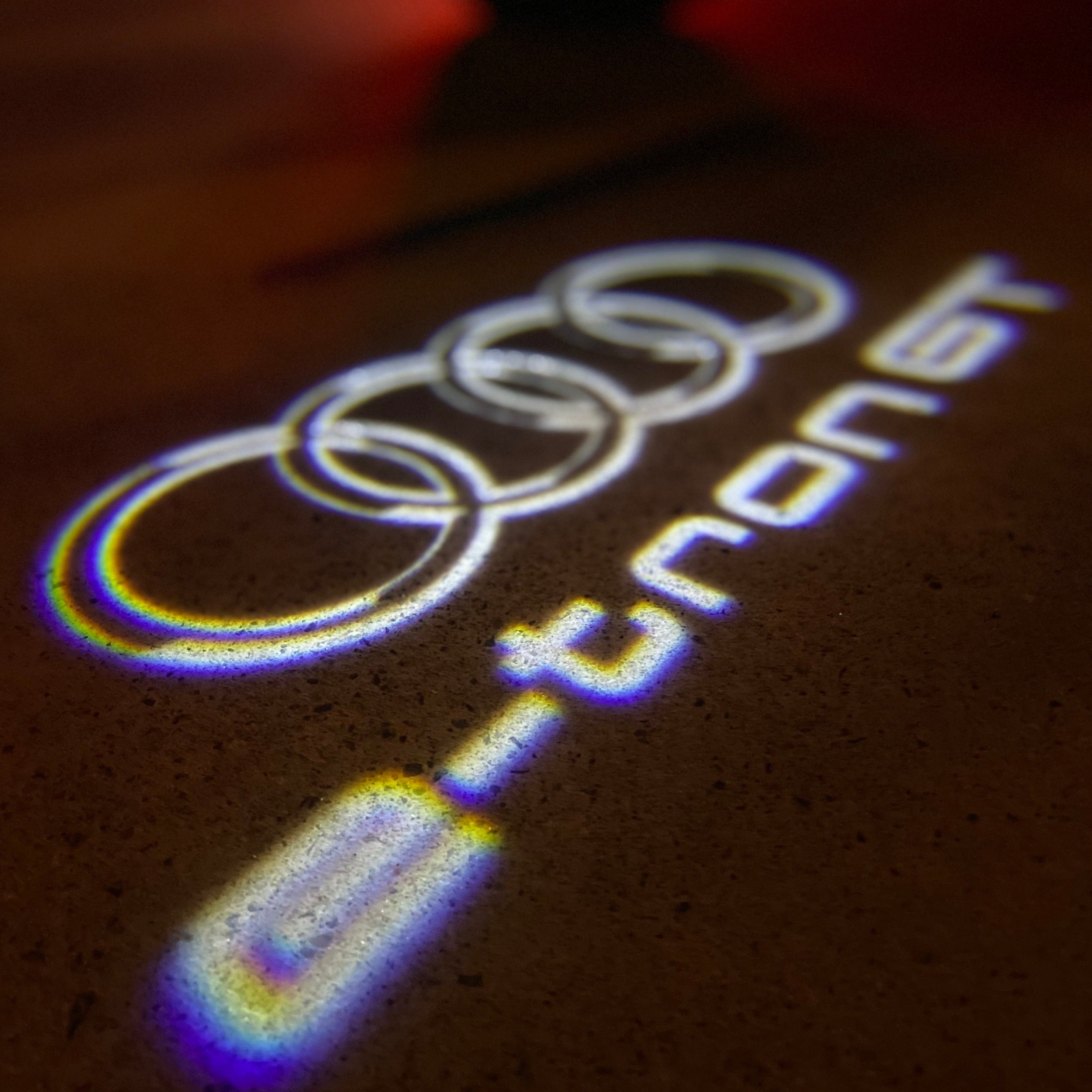 AUDI LOGO PROJECTOT LIGHTS Nr.19 (الكمية 1 = 2 Logo Films /2 أضواء الباب)