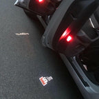 AUDI LOGO PROJECTOT LIGHTS Nr.100 (الكمية 1 = 2 Logo Films /2 أضواء الباب)