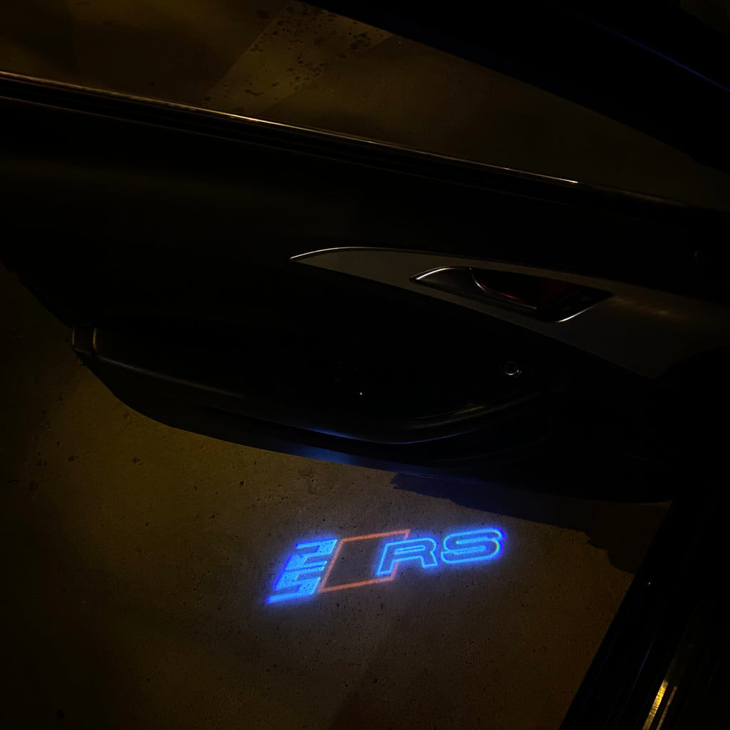 AUDI LOGO PROJECTOT LIGHTS Nr.19 (الكمية 1 = 2 Logo Films /2 أضواء الباب)