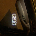 AUDI LOGO PROJECTOT LIGHTS Nr.10 (الكمية 1 = 2 Logo Films /2 أضواء الباب)