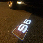أضواء جهاز عرض شعار AUDI رقم 26 (الكمية 1 = 2 فيلم شعار / 2 مصباح باب)