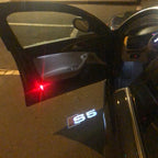 أضواء جهاز عرض شعار AUDI رقم 26 (الكمية 1 = 2 فيلم شعار / 2 مصباح باب)