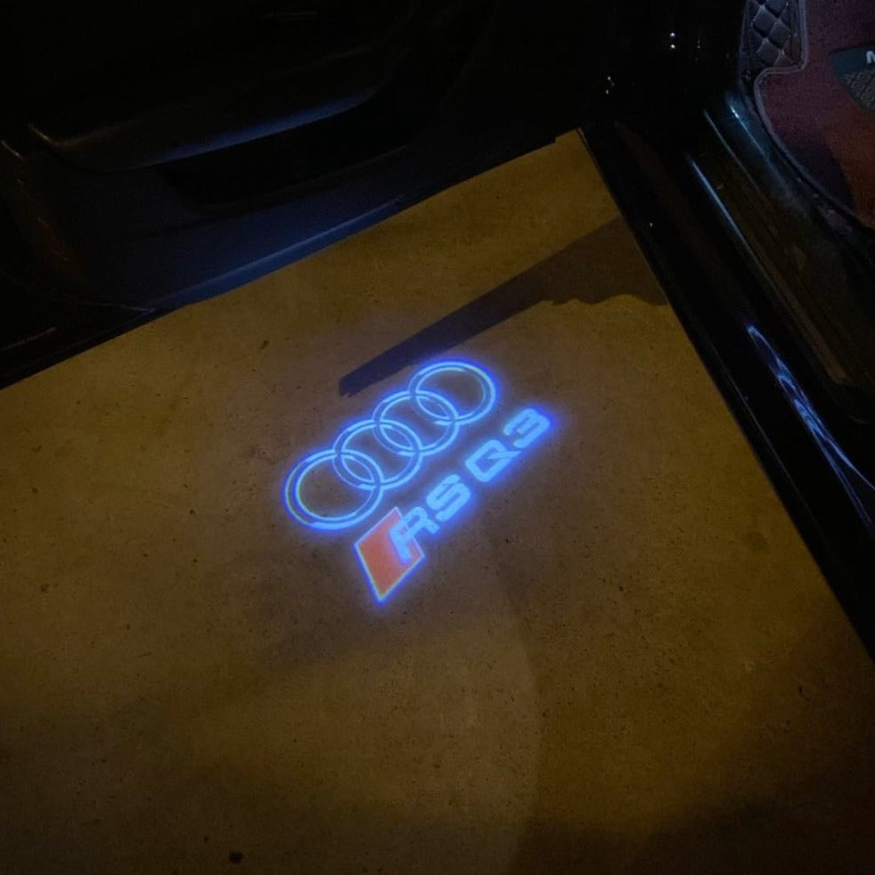 AUDI LOGO PROJECTOT LIGHTS Nr.19 (الكمية 1 = 2 Logo Films /2 أضواء الباب)
