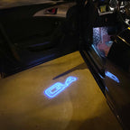 AUDI LOGO PROJECTOT LIGHTS Nr.19 (الكمية 1 = 2 Logo Films /2 أضواء الباب)