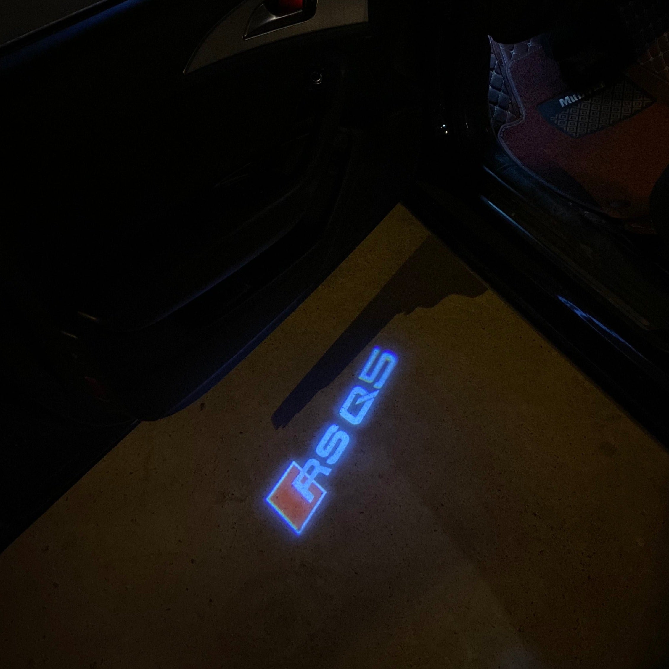 AUDI LOGO PROJECTOT LIGHTS Nr.19 (الكمية 1 = 2 Logo Films /2 أضواء الباب)
