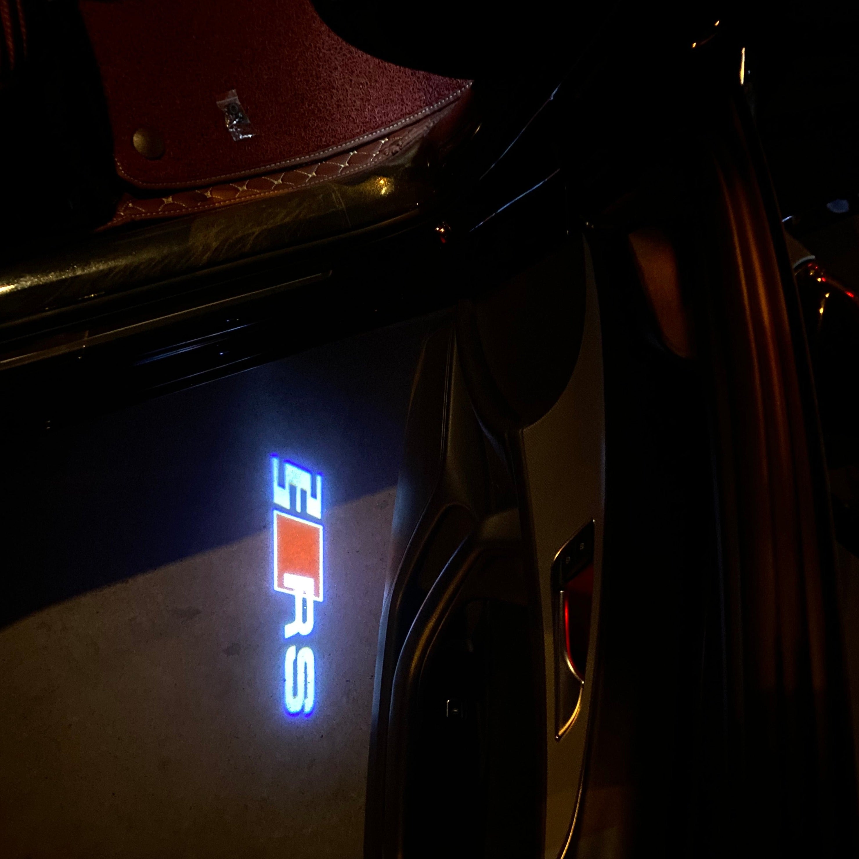 AUDI LOGO PROJECTOT LIGHTS Nr.19 (الكمية 1 = 2 Logo Films /2 أضواء الباب)