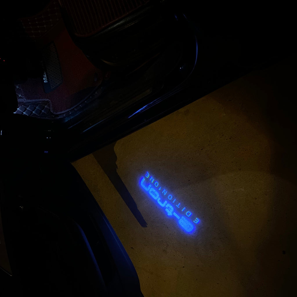 AUDI LOGO PROJECTOT LIGHTS Nr.19 (الكمية 1 = 2 Logo Films /2 أضواء الباب)