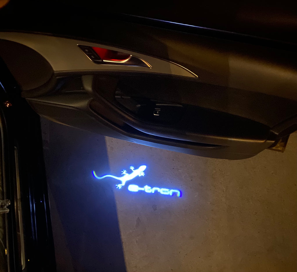 AUDI LOGO PROJECTOT LIGHTS Nr.19 (الكمية 1 = 2 Logo Films /2 أضواء الباب)