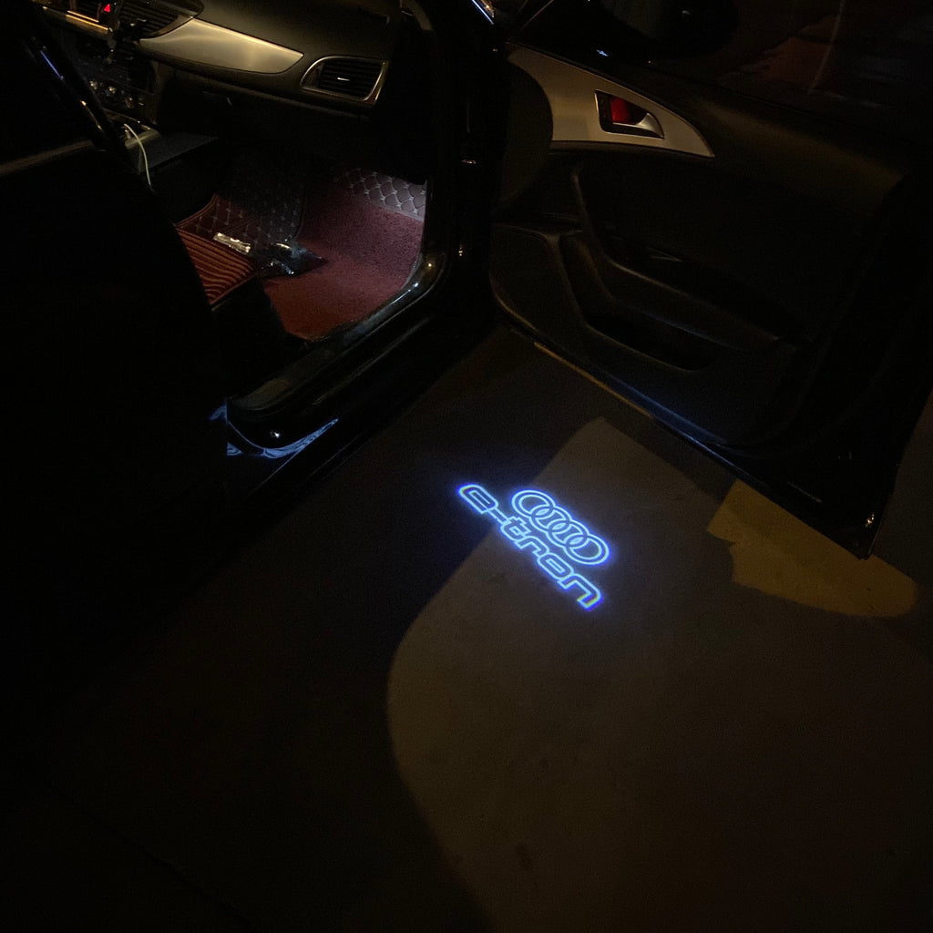 AUDI LOGO PROJECTOT LIGHTS Nr.19 (الكمية 1 = 2 Logo Films /2 أضواء الباب)